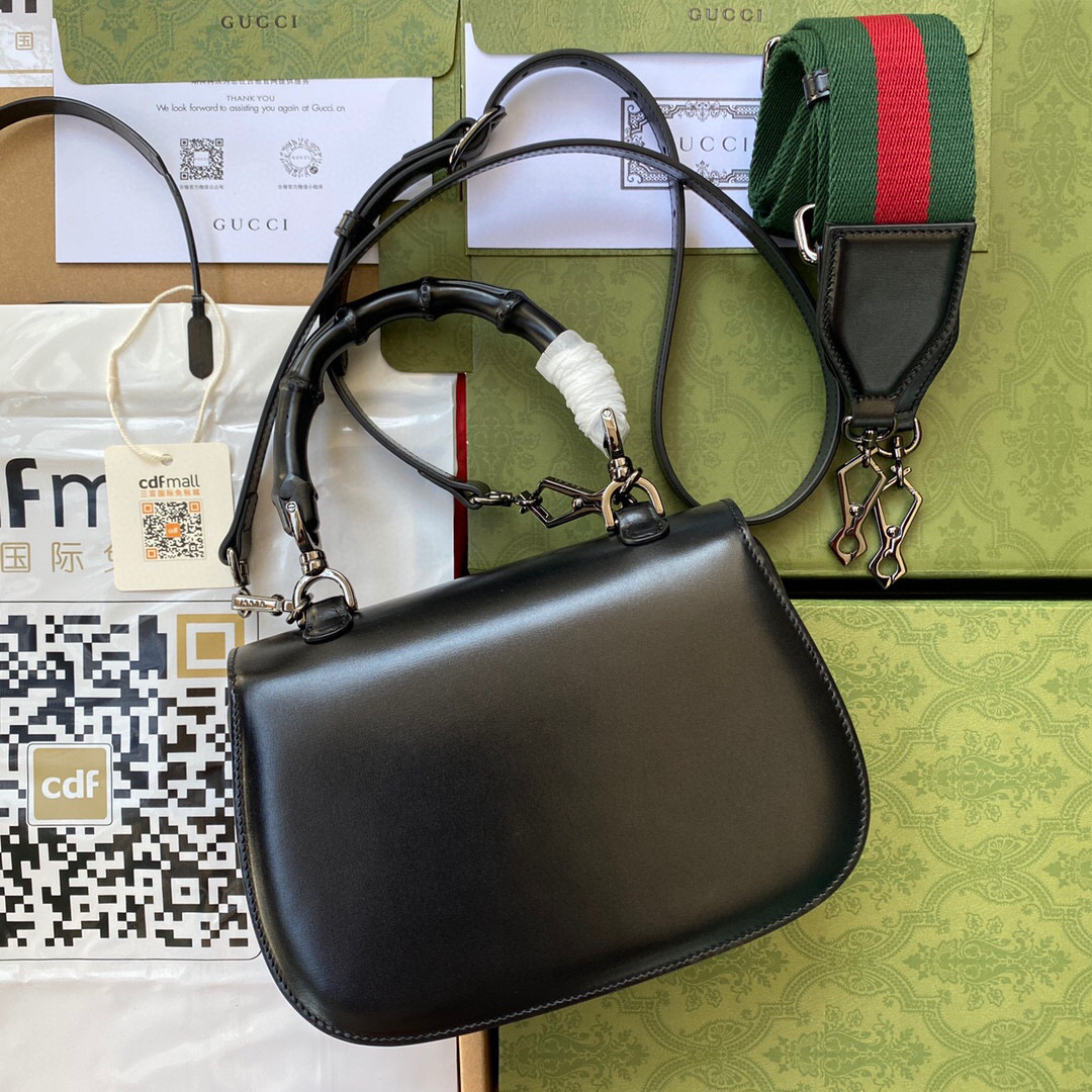 G*u*i bamboo handle bag