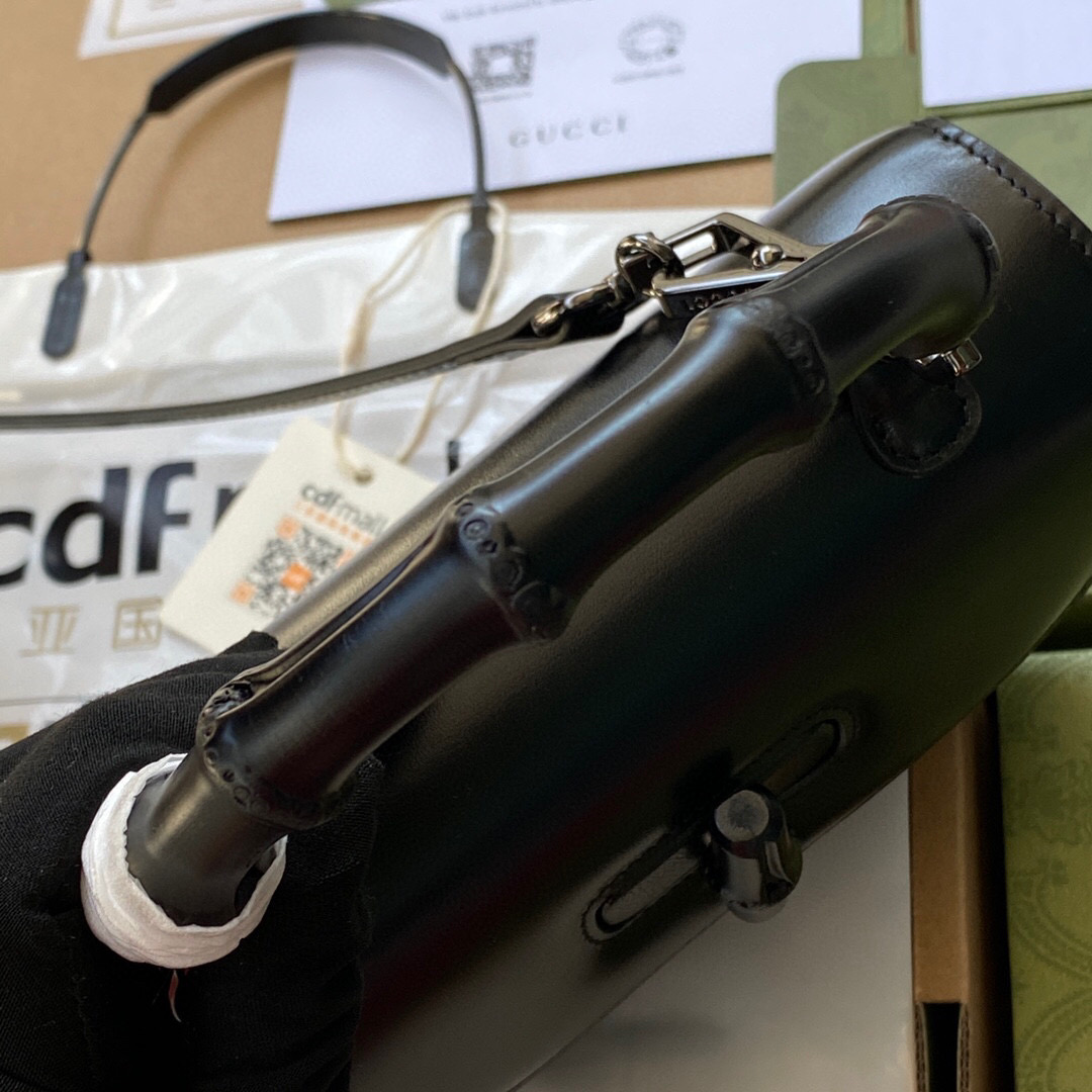 G*u*i bamboo handle bag