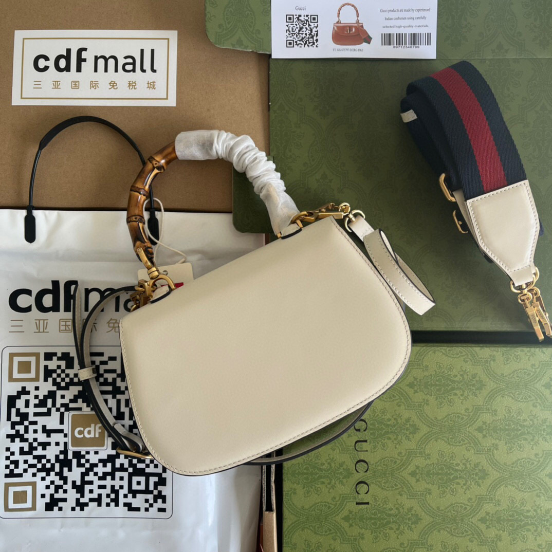 G*u*i bamboo handle bag