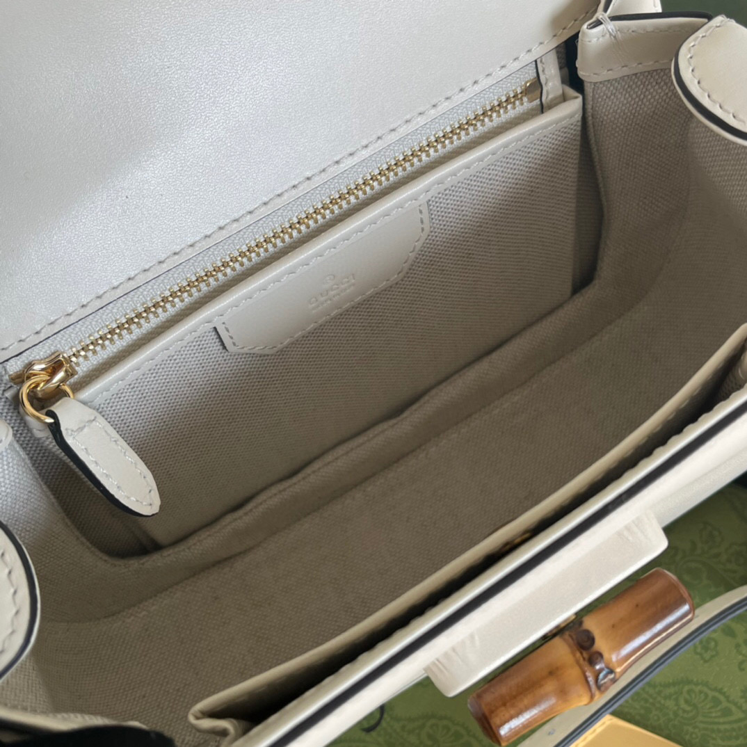 G*u*i bamboo handle bag