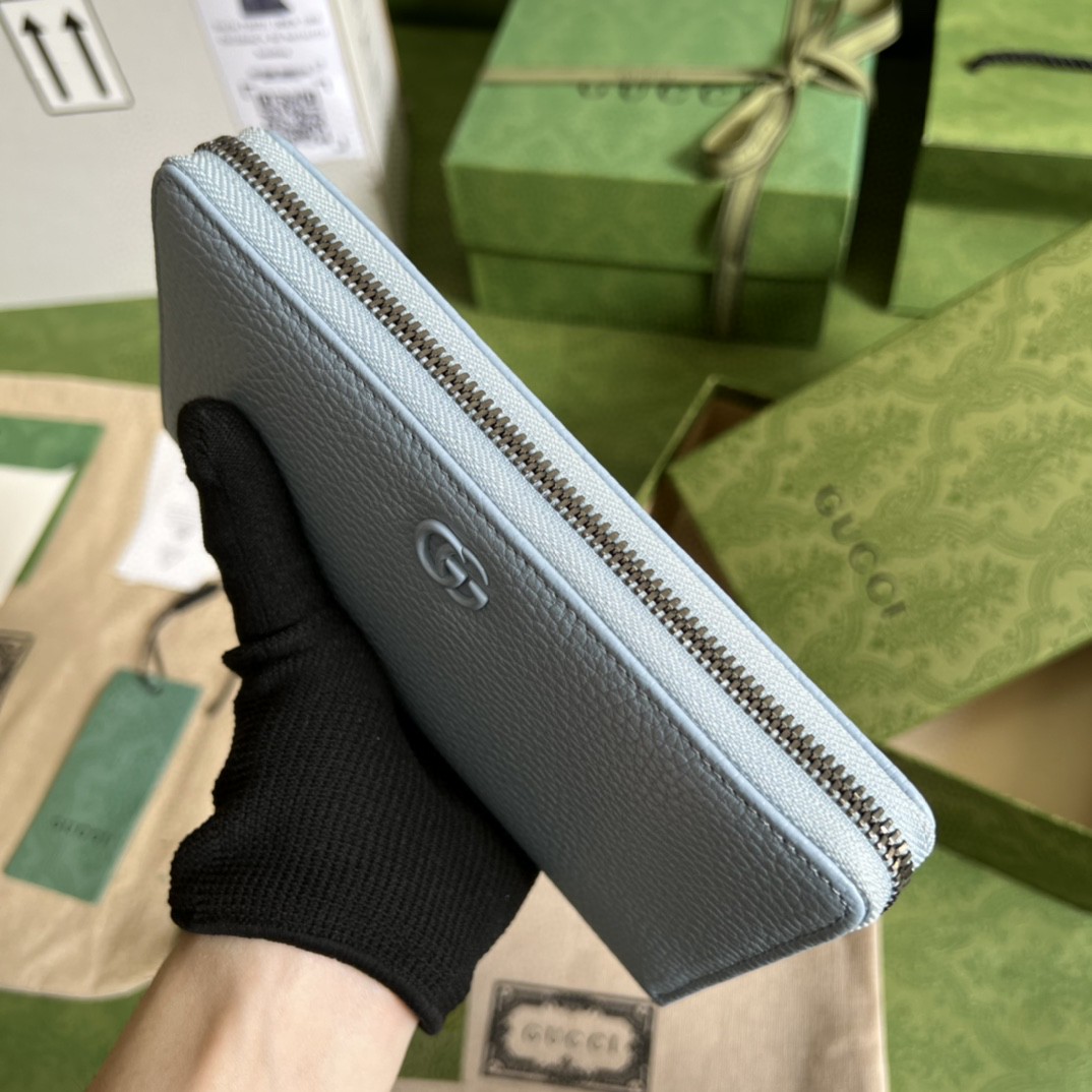 G*u*i leather zip around wallet