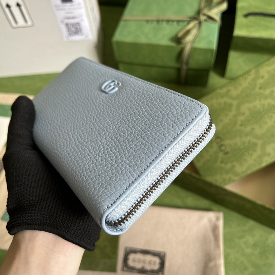 G*u*i leather zip around wallet