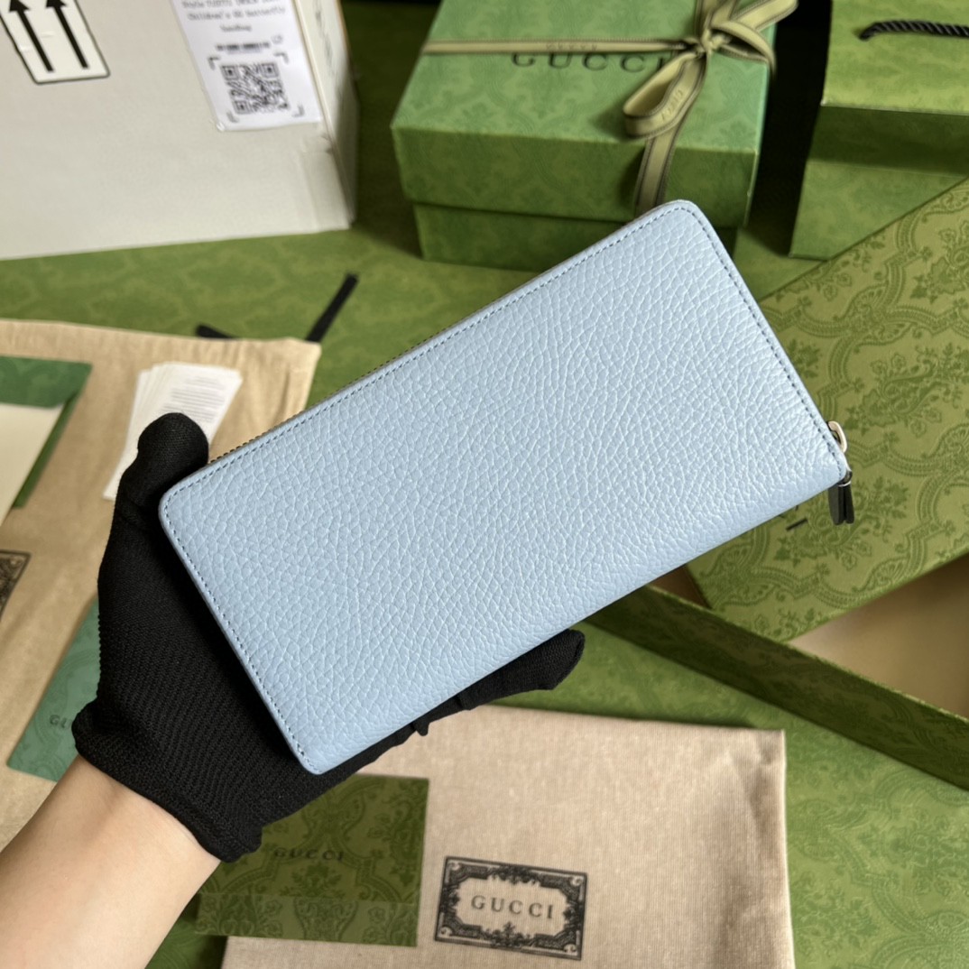 G*u*i leather zip around wallet