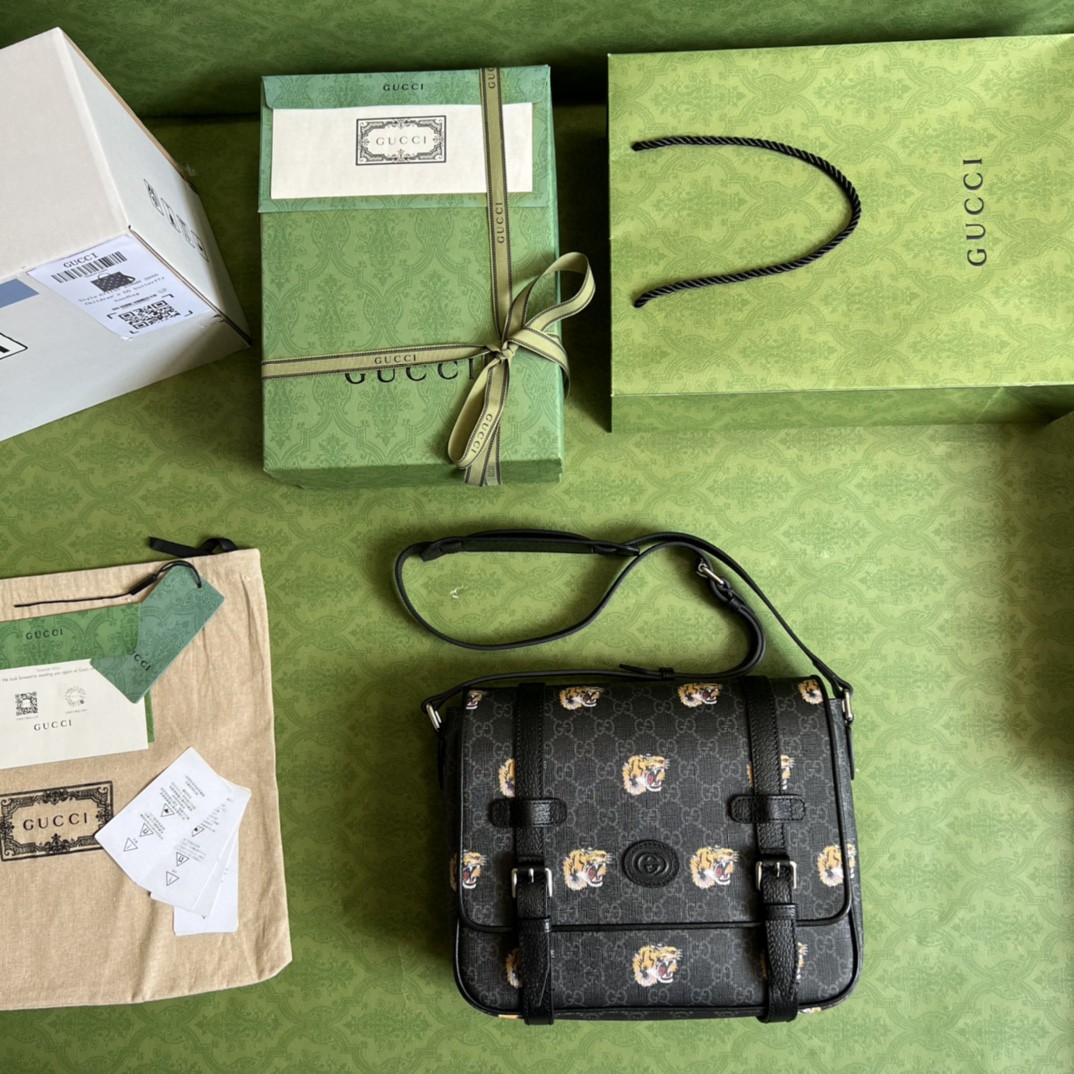 G*u*i gg messenger bag