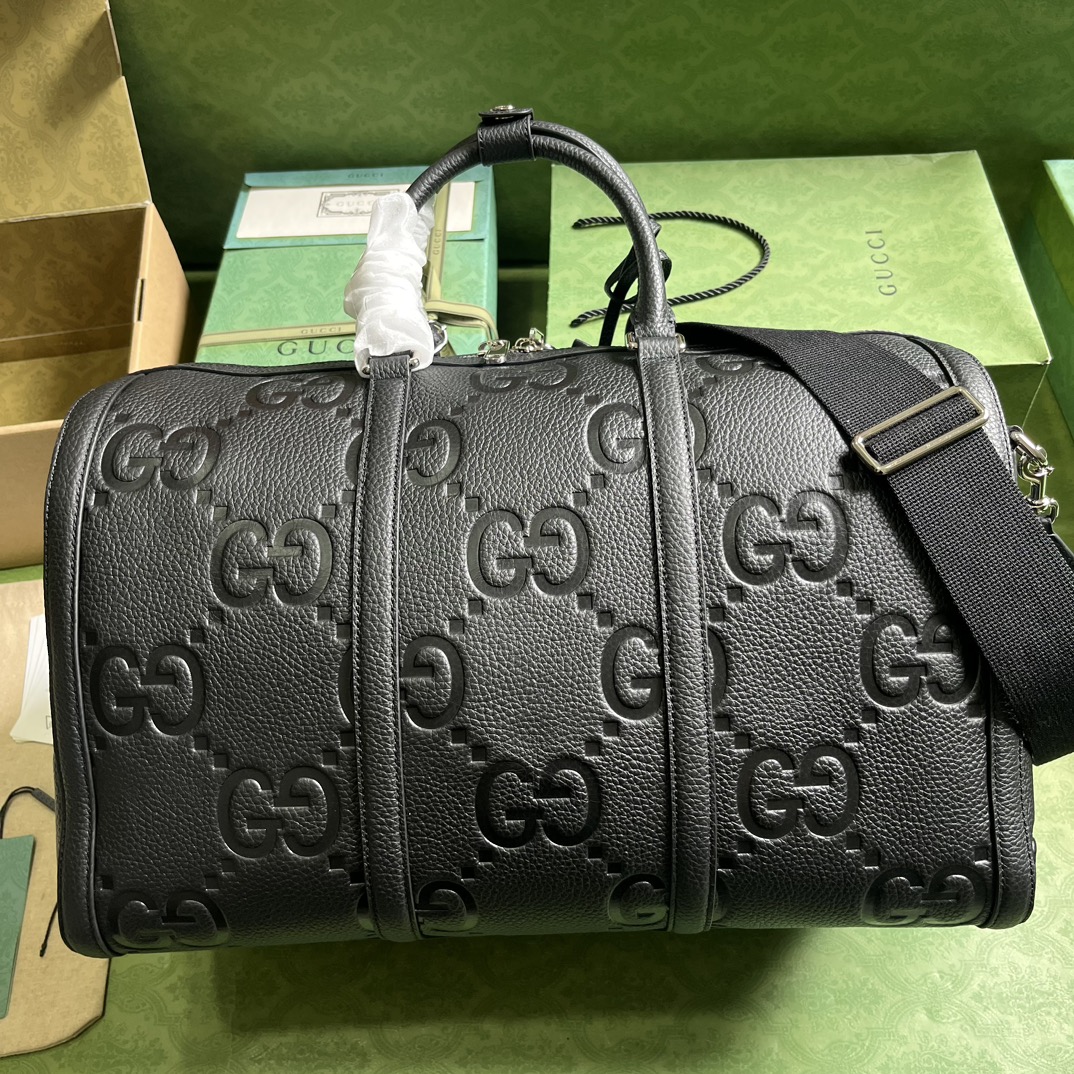 G*u*i gg duffle bag