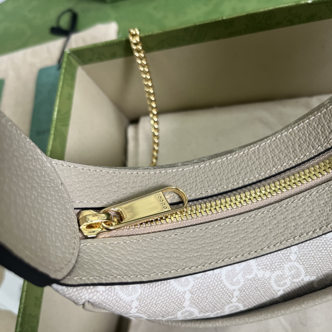 G*u*i half-moon-shaped mini bag with interlocking g