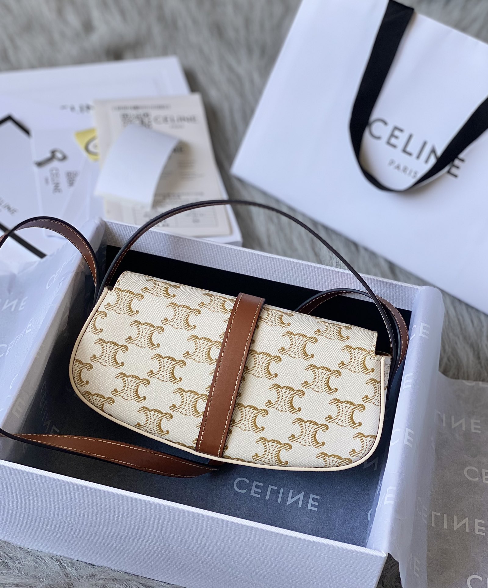 Ce**e mini tabou clutch on strap
