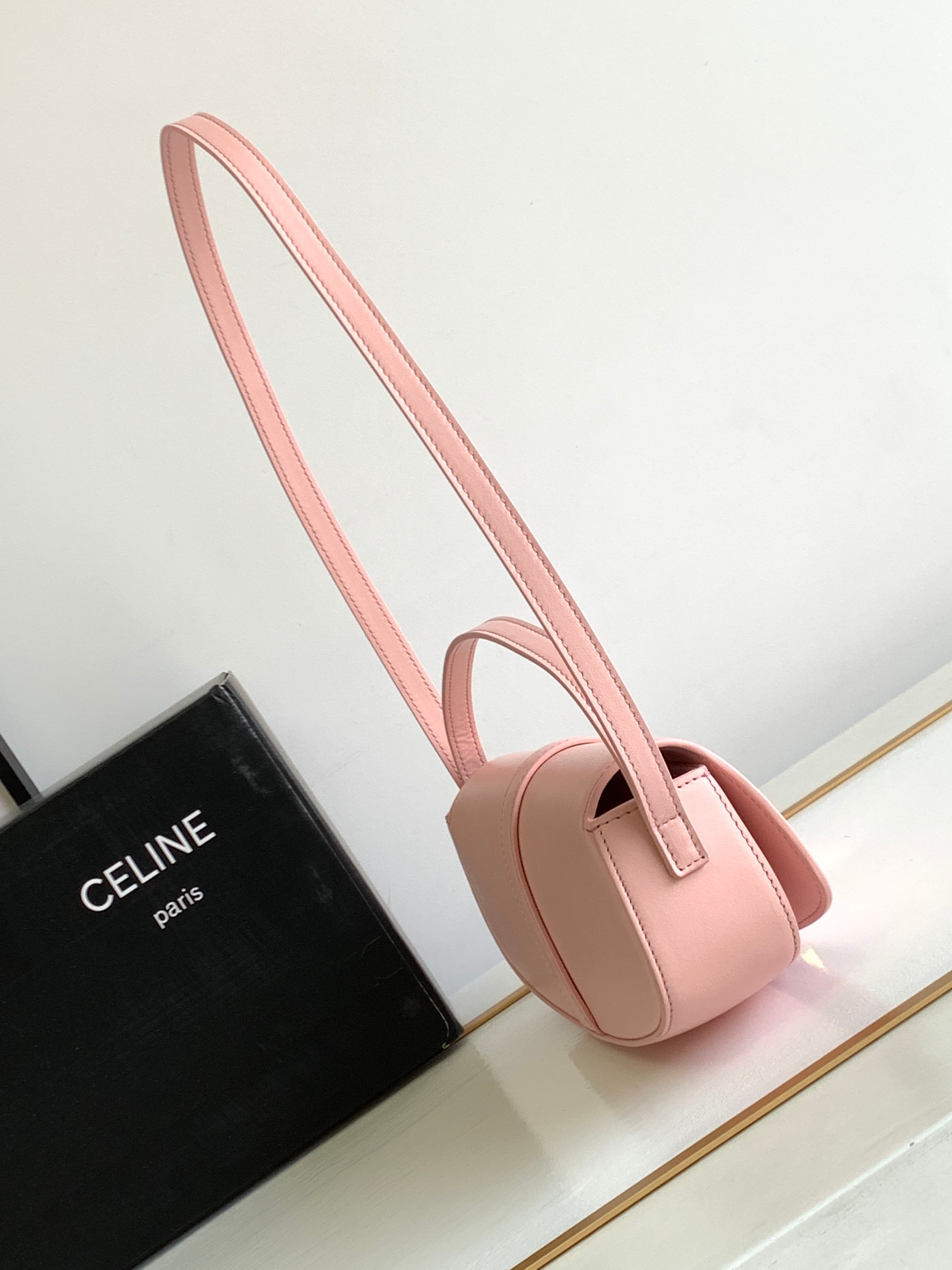 Ce**e mini tabou clutch on strap