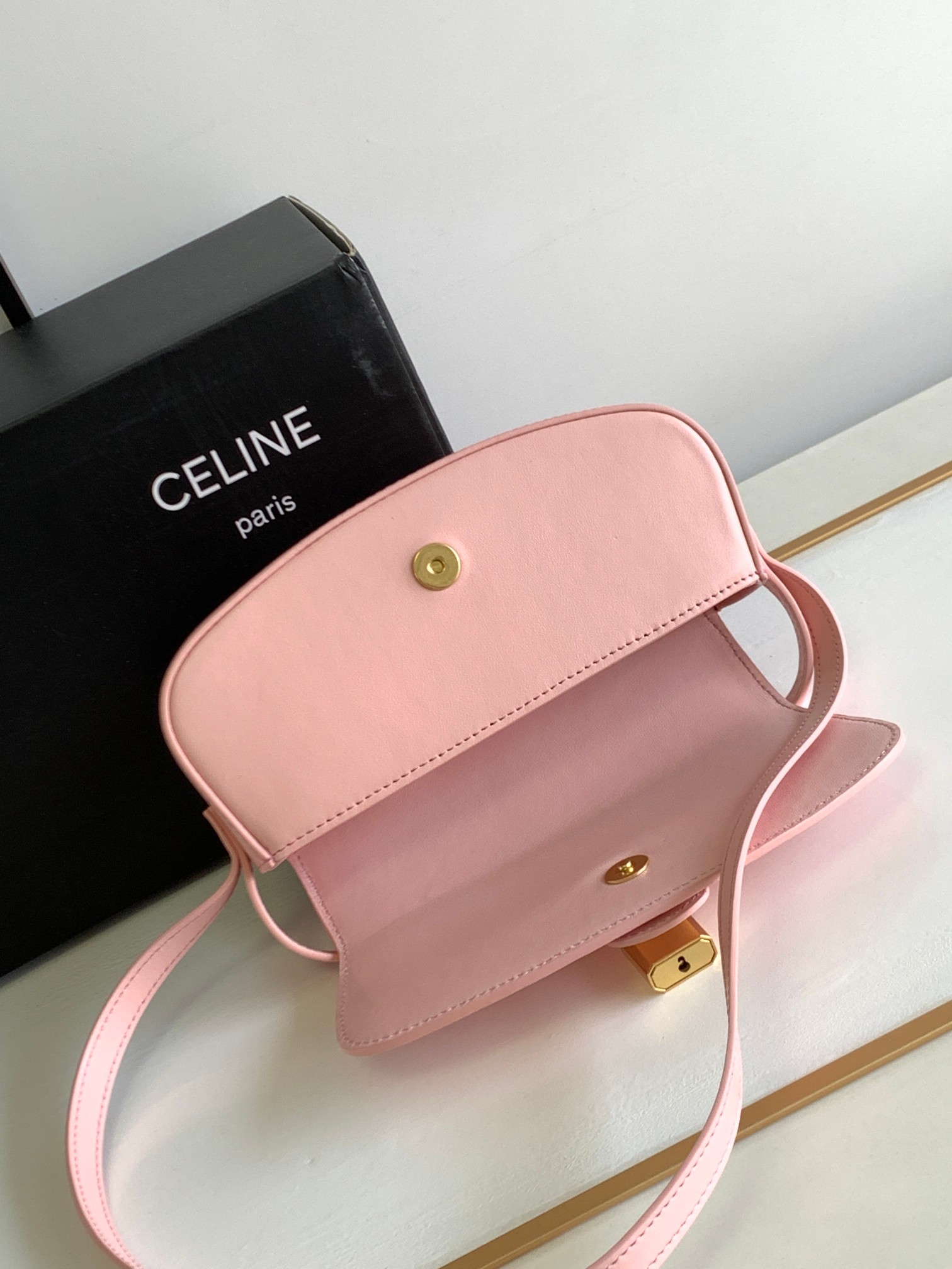 Ce**e mini tabou clutch on strap