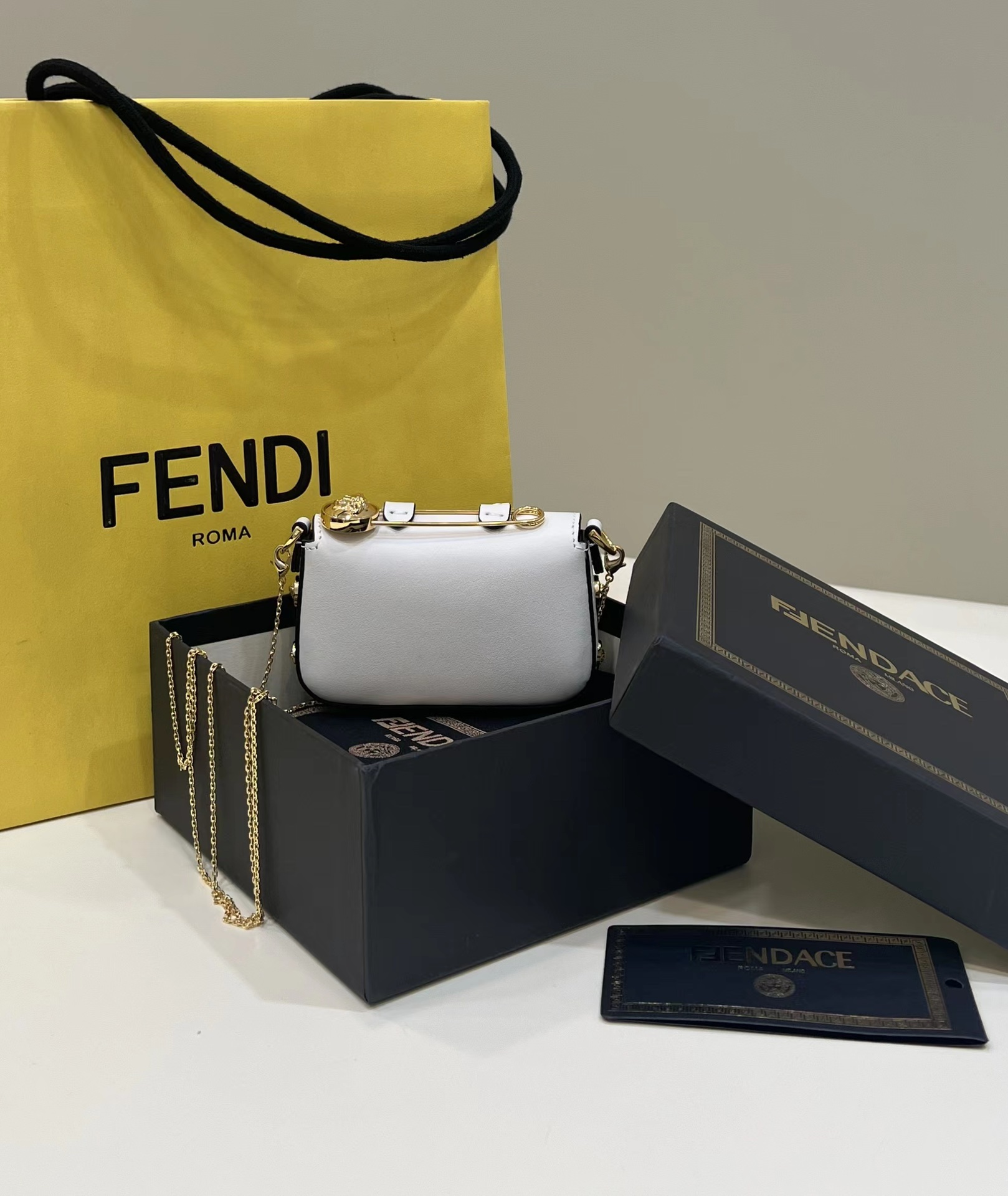 F**di nano baguette charm