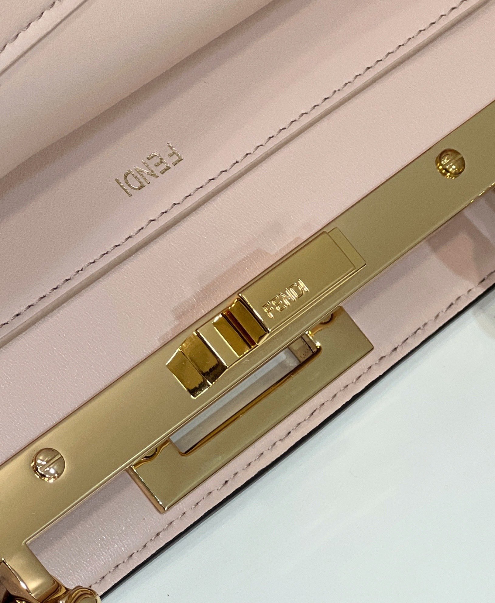 F**di new style  peekaboo i see u