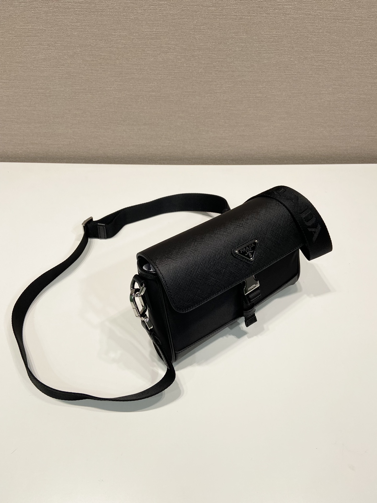 Pra*a re-nylon and leather shoulder bag