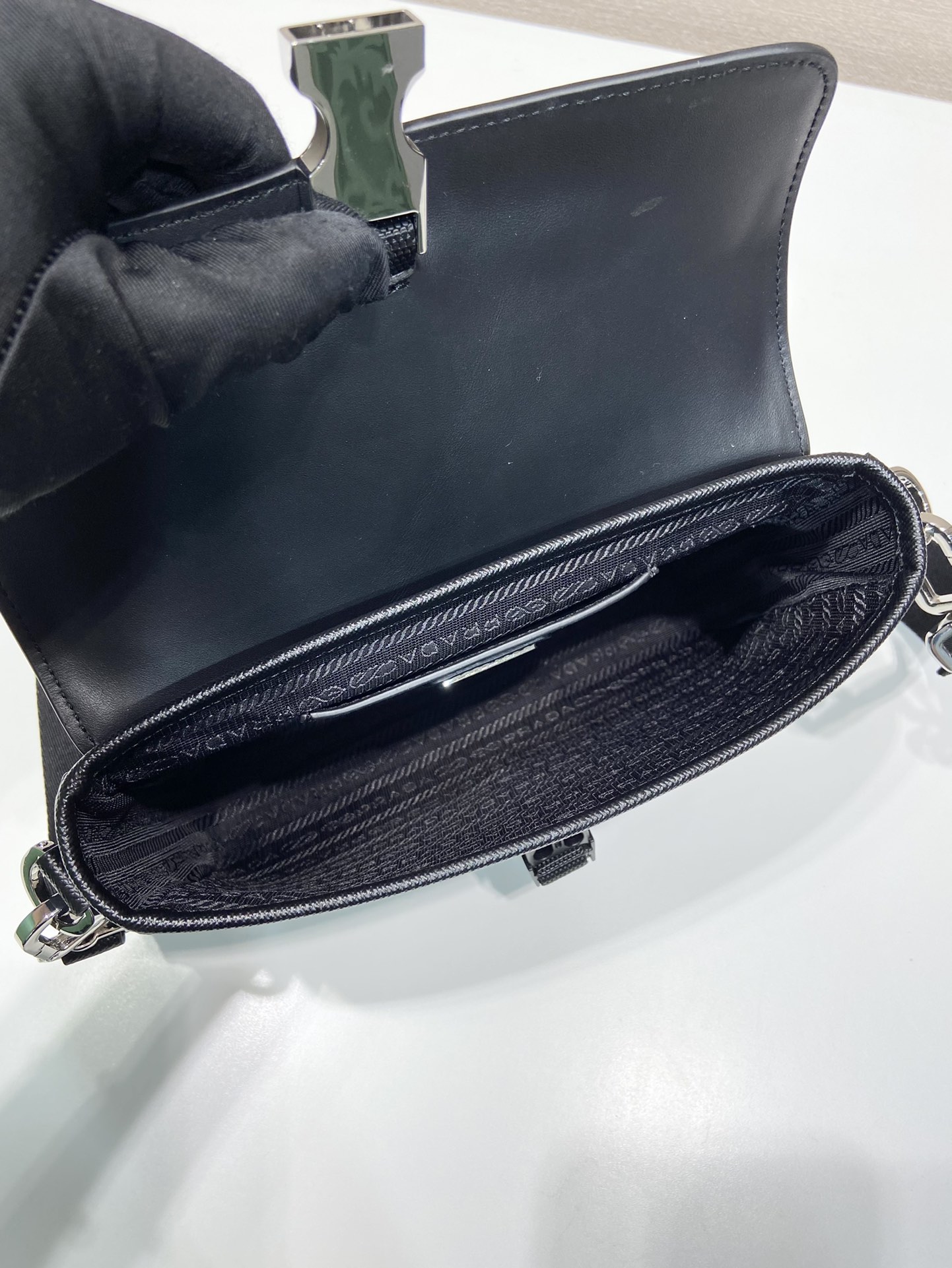 Pra*a re-nylon and leather shoulder bag