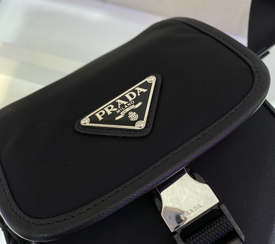 Pra*a saffiano & re-nylon smartphone case bag