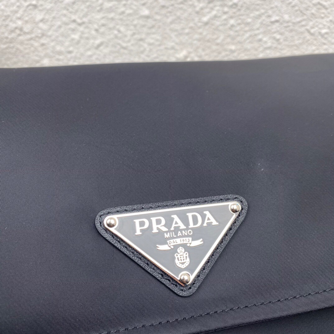Pra*a black medium padded re-nylon shoulder bag