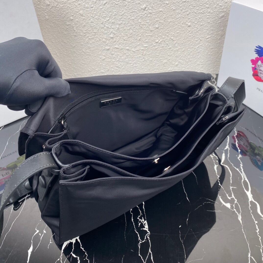 Pra*a black medium padded re-nylon shoulder bag