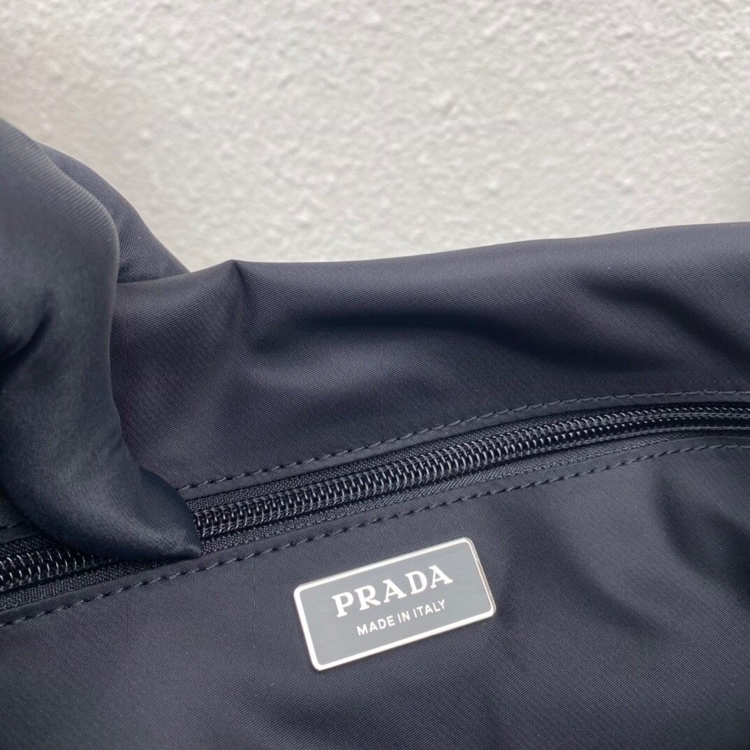 Pra*a  black medium padded re-nylon shoulder bag