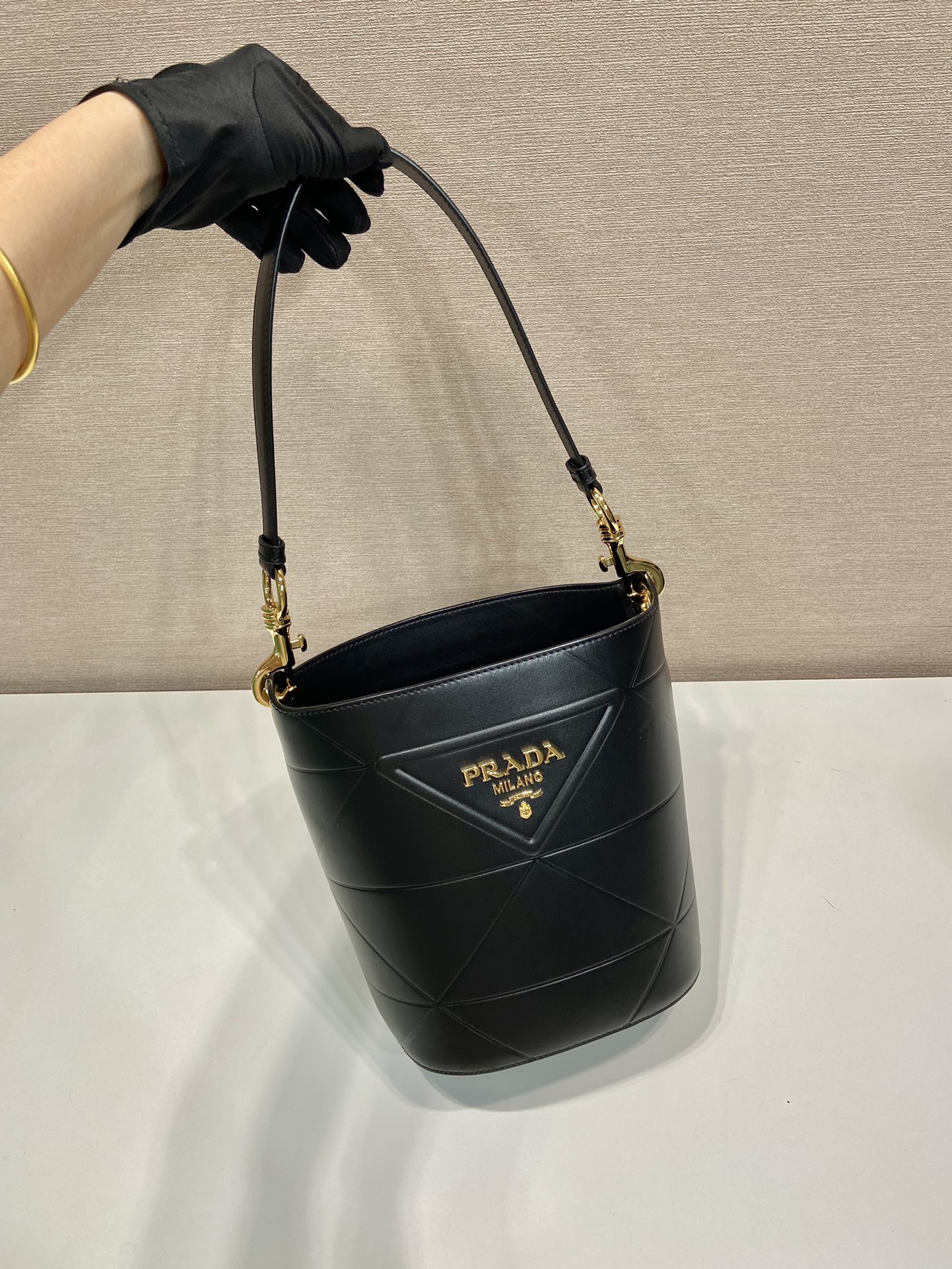 Pra*a leather bucket bag