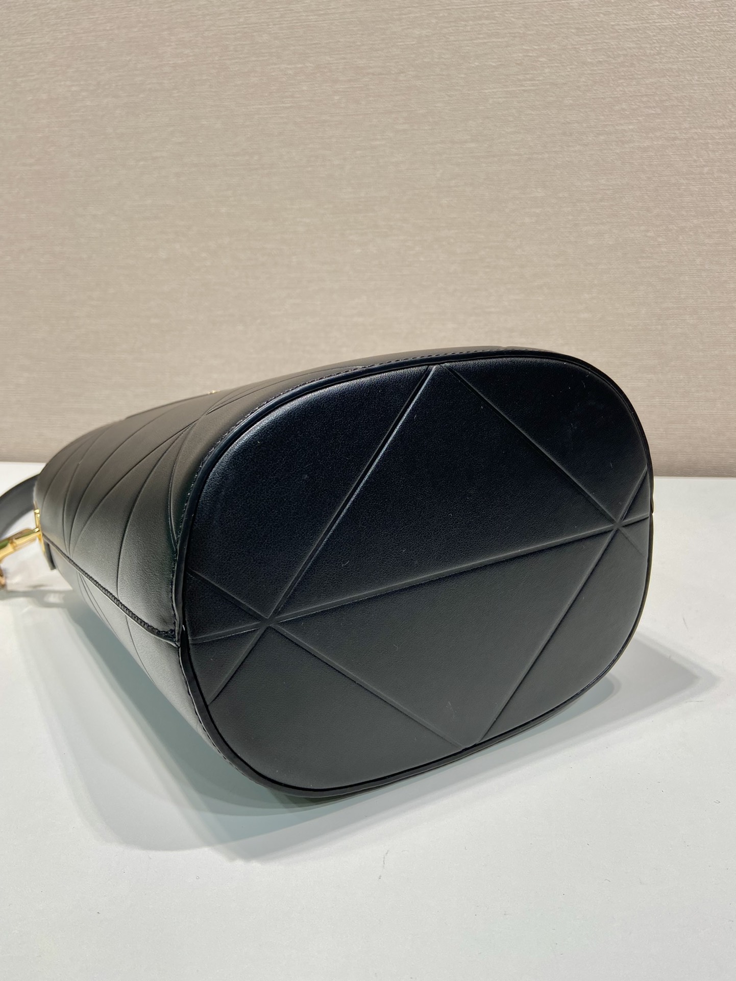 Pra*a leather bucket bag