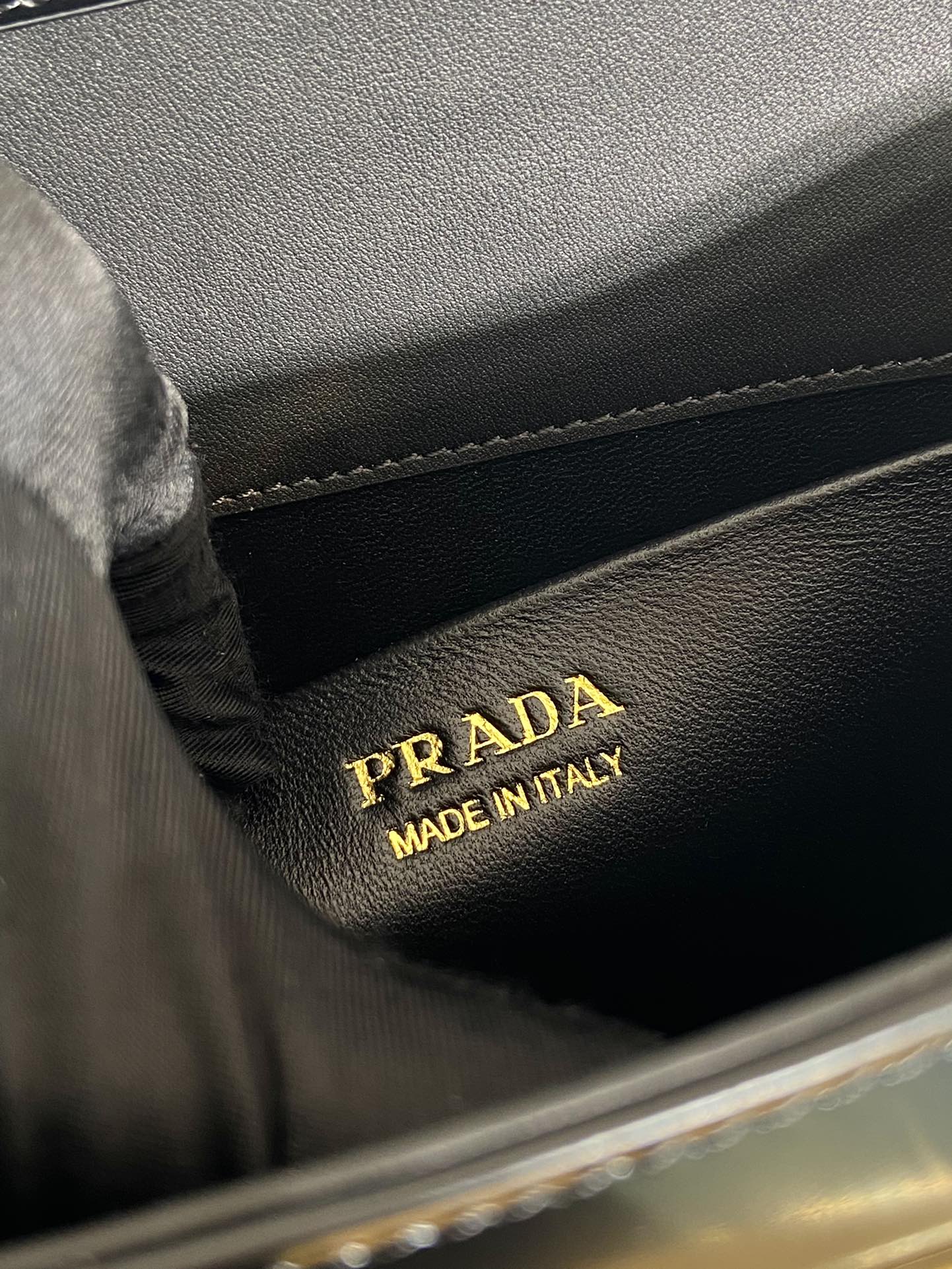 Pra*a brushed leather handbag