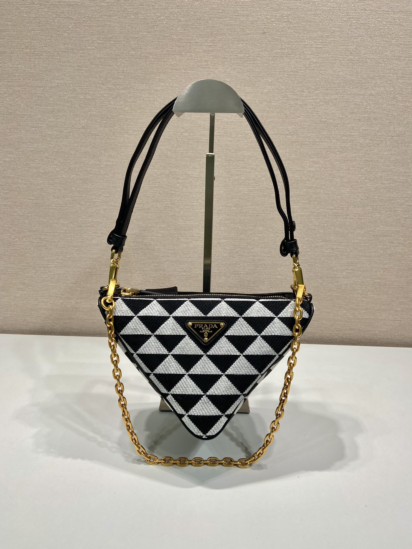 Pra*a symbole leather and fabric mini bag