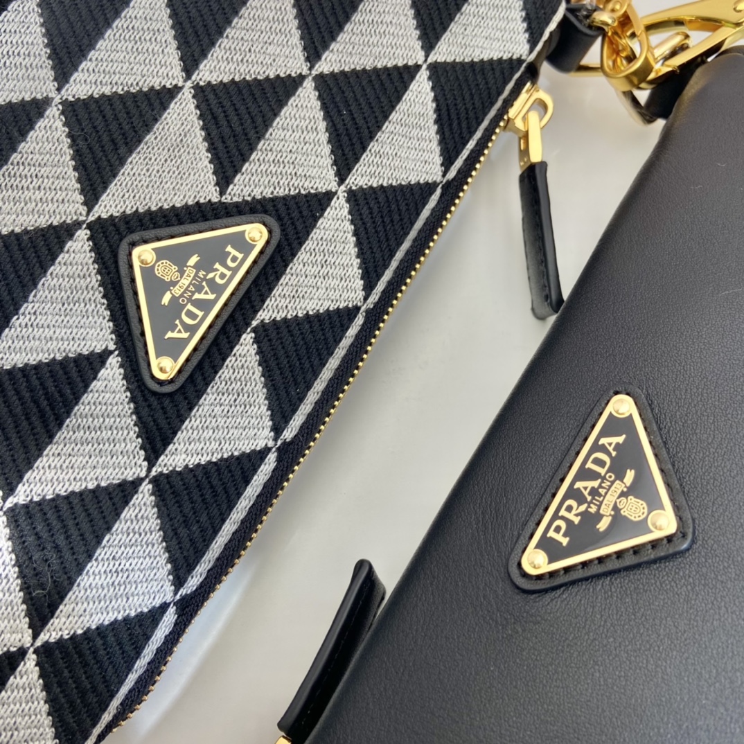 Pra*a symbole leather and fabric mini bag