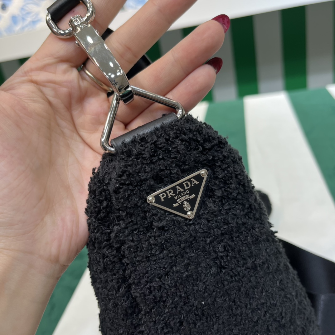 Pra*a triangle shoulder bag
