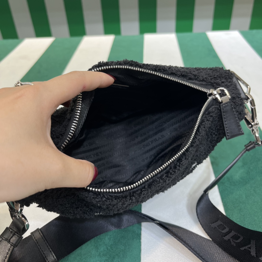 Pra*a triangle shoulder bag