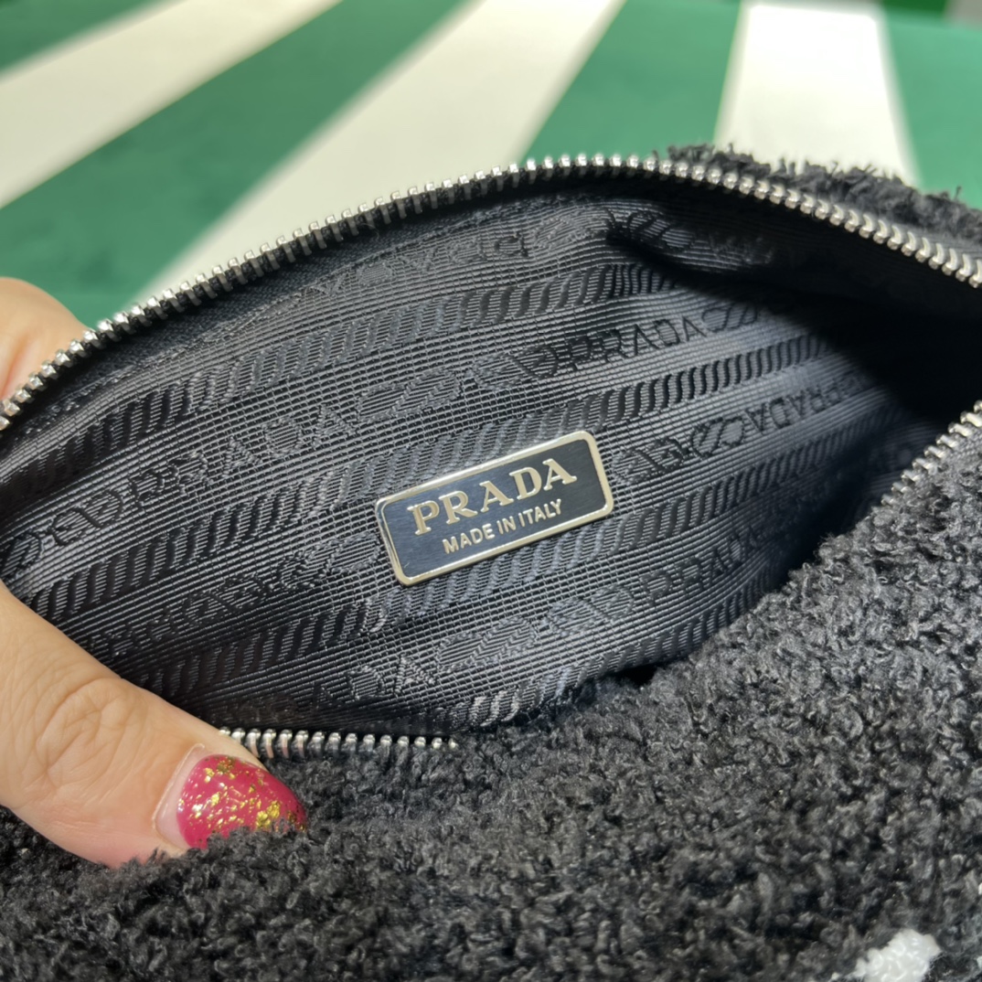 Pra*a triangle shoulder bag