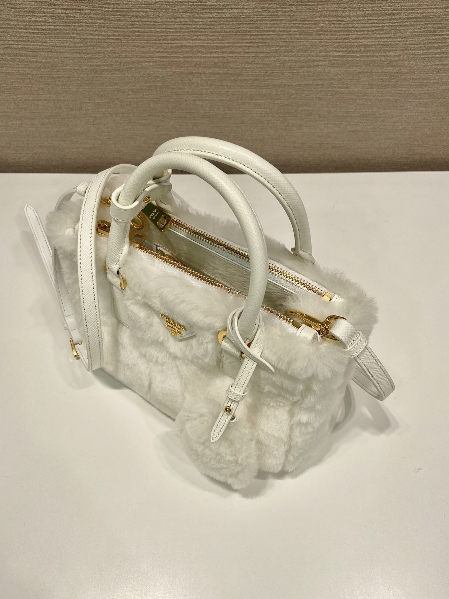 Pra*a galleria saffiano shearling top-handle bag