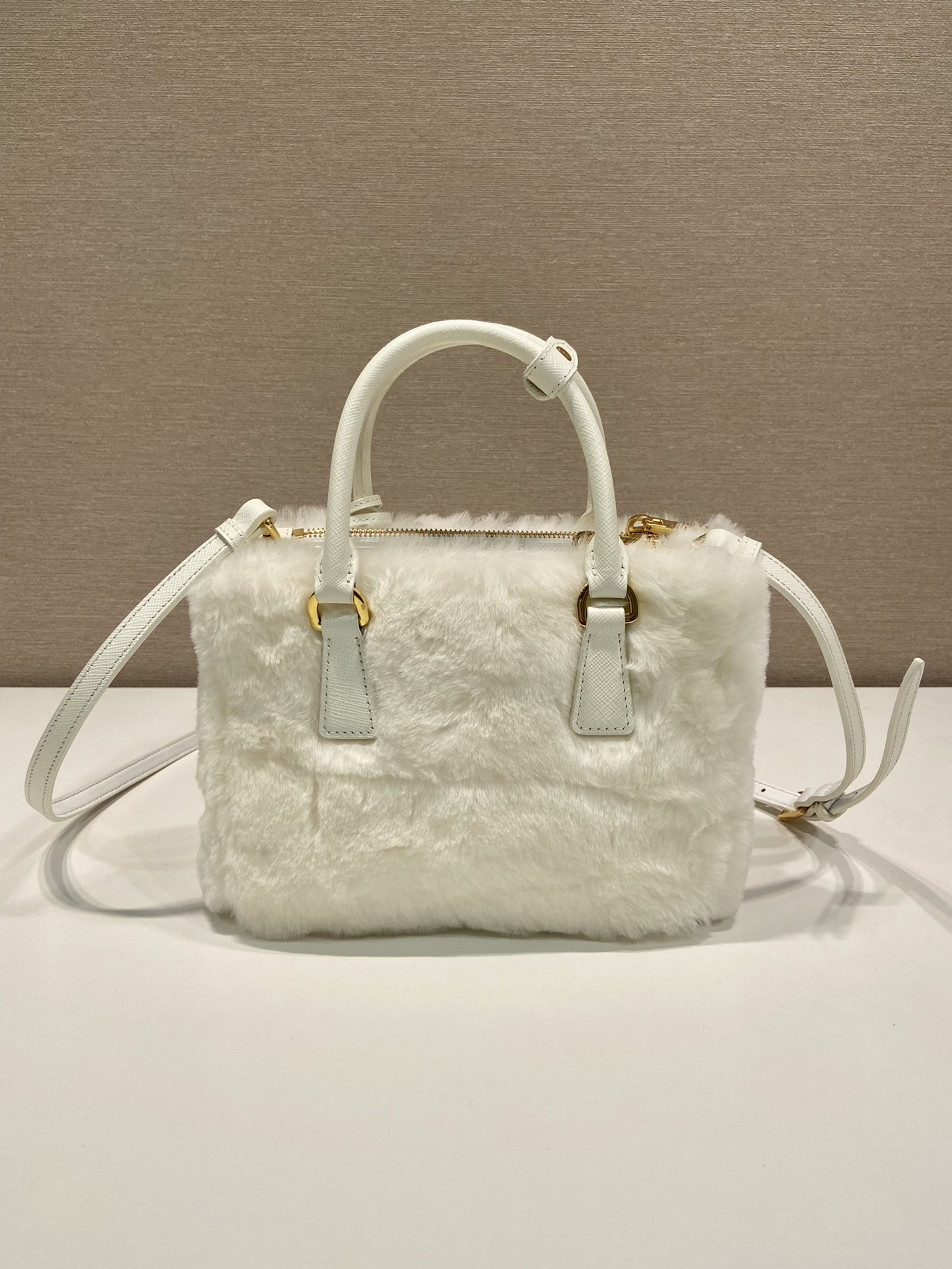 Pra*a galleria saffiano shearling top-handle bag