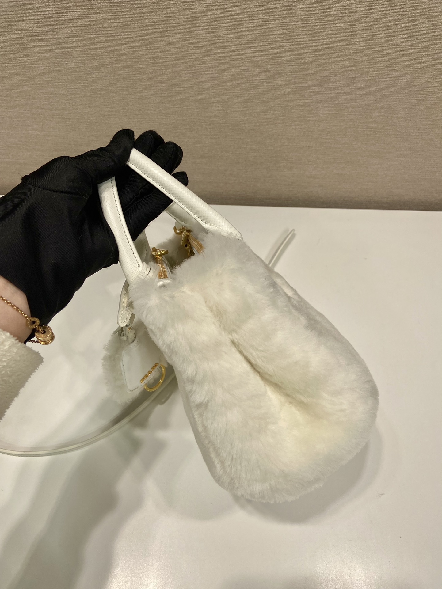 Pra*a galleria saffiano shearling top-handle bag