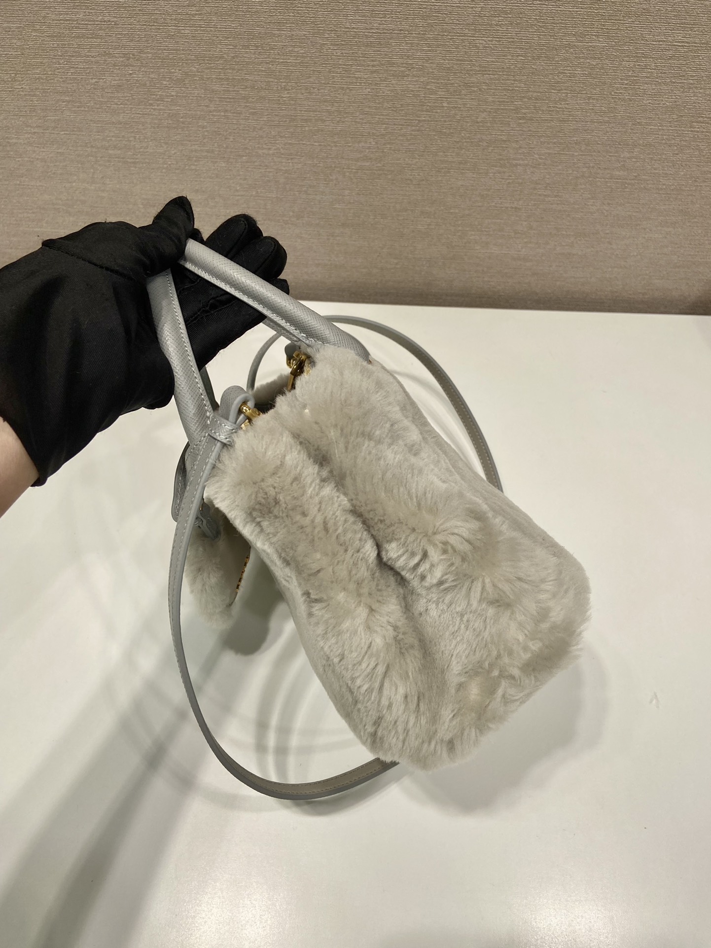 Pra*a galleria saffiano shearling top-handle bag