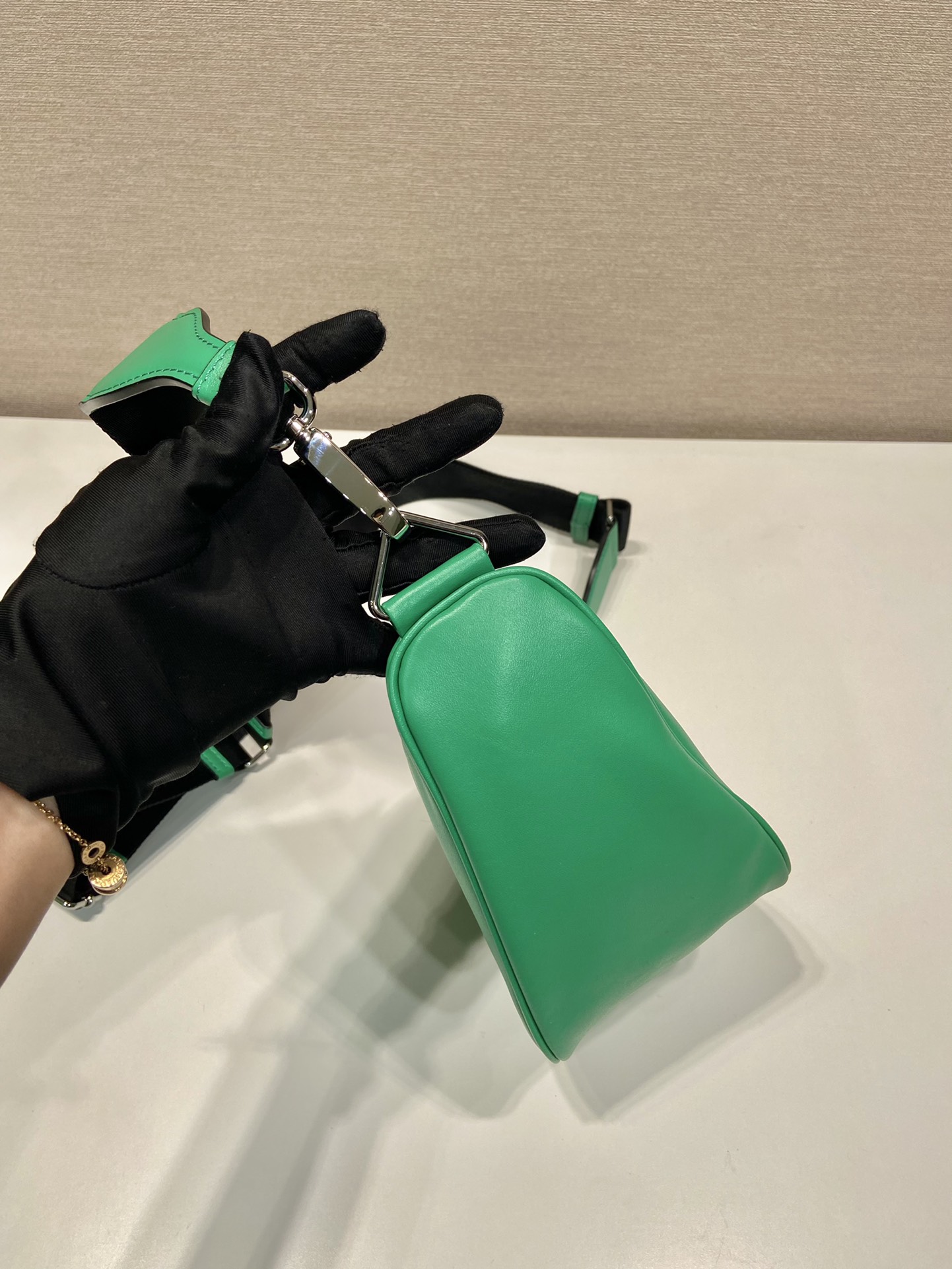 saffiano Pra*a triangle bag