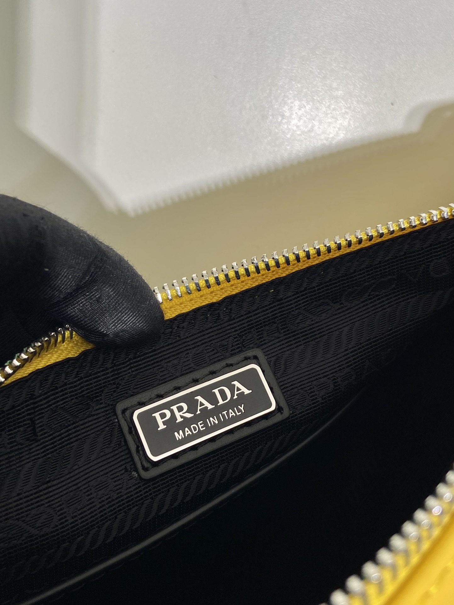 saffiano Pra*a triangle bag