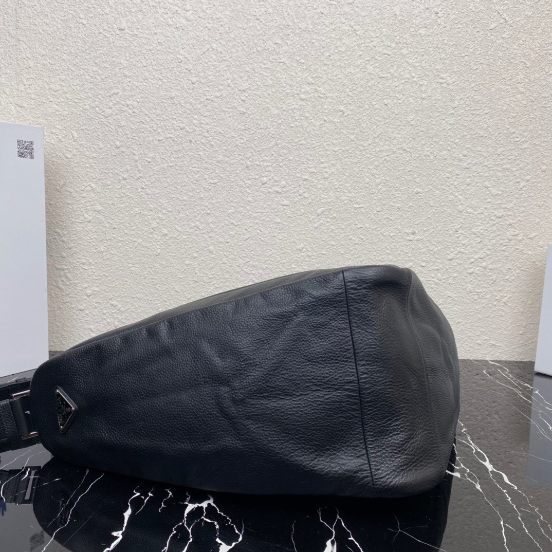 large leather Pra*a triangle bag