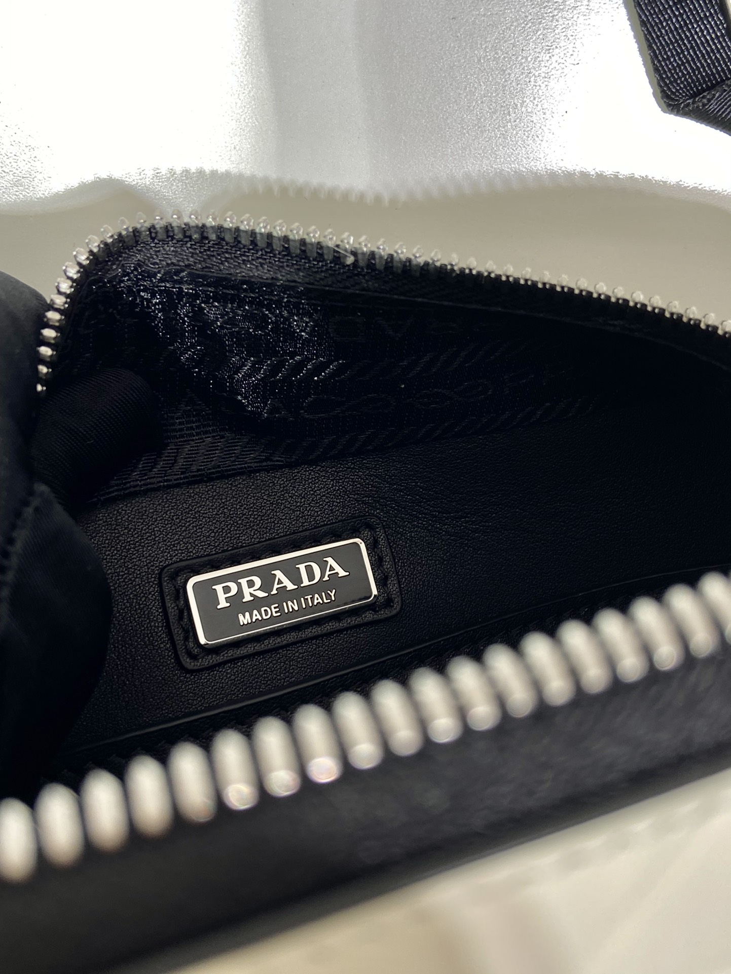 Pra*a small Pra*a brique leather bag