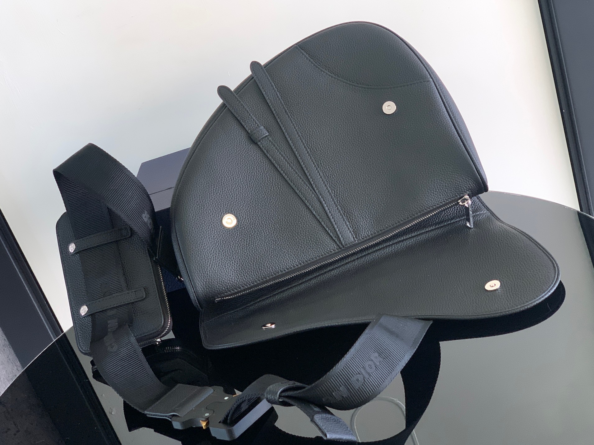 D*or saddle leather bag