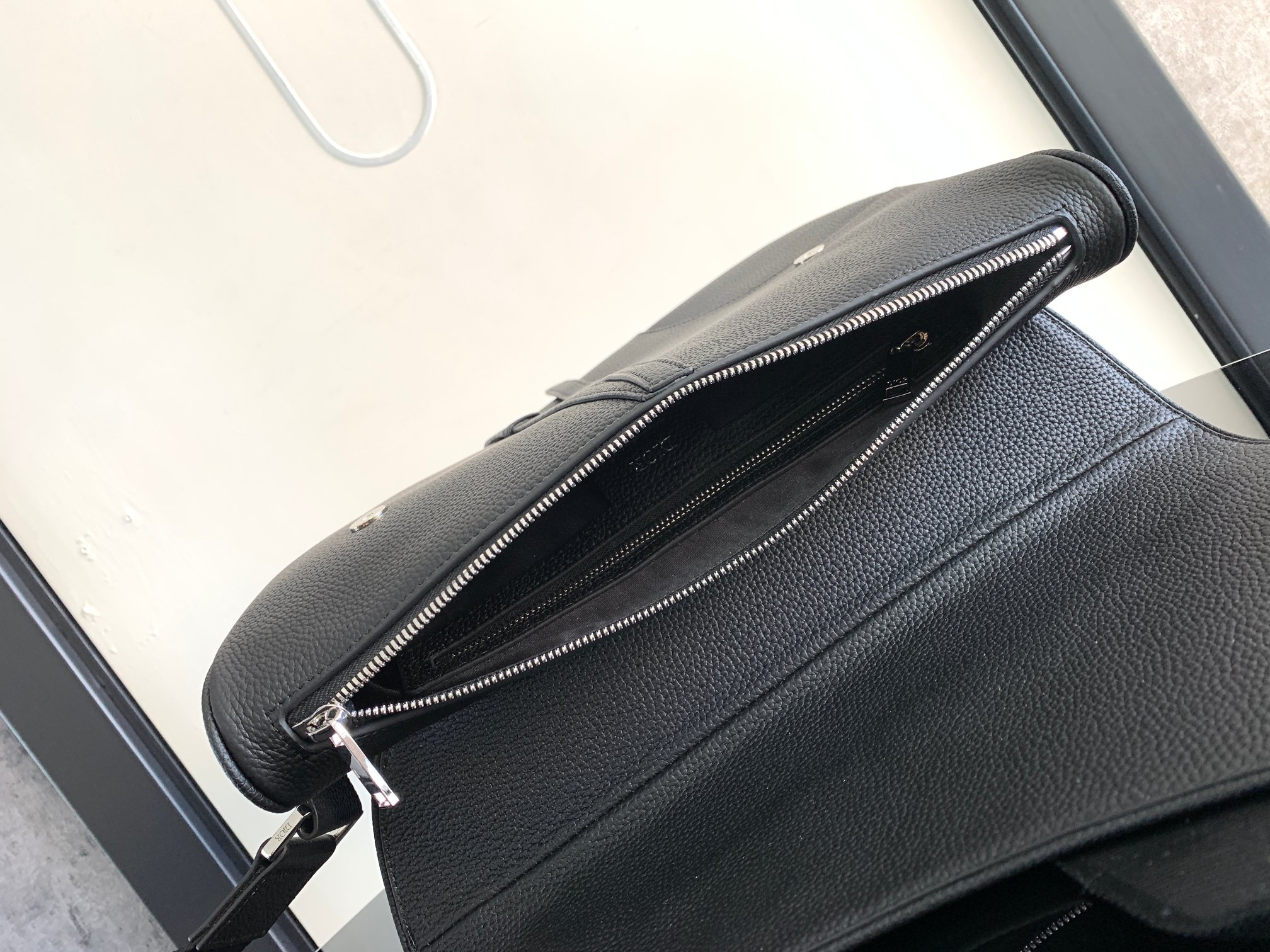 D*or saddle leather bag