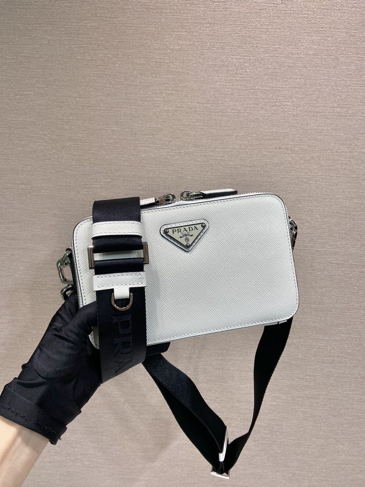 Pra*a brique saffiano leather bag