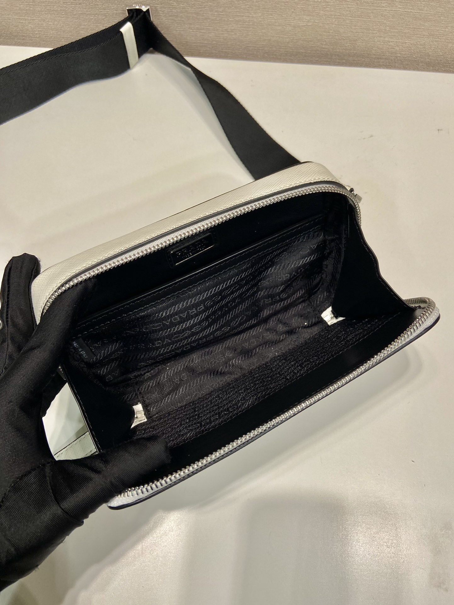 Pra*a brique saffiano leather bag