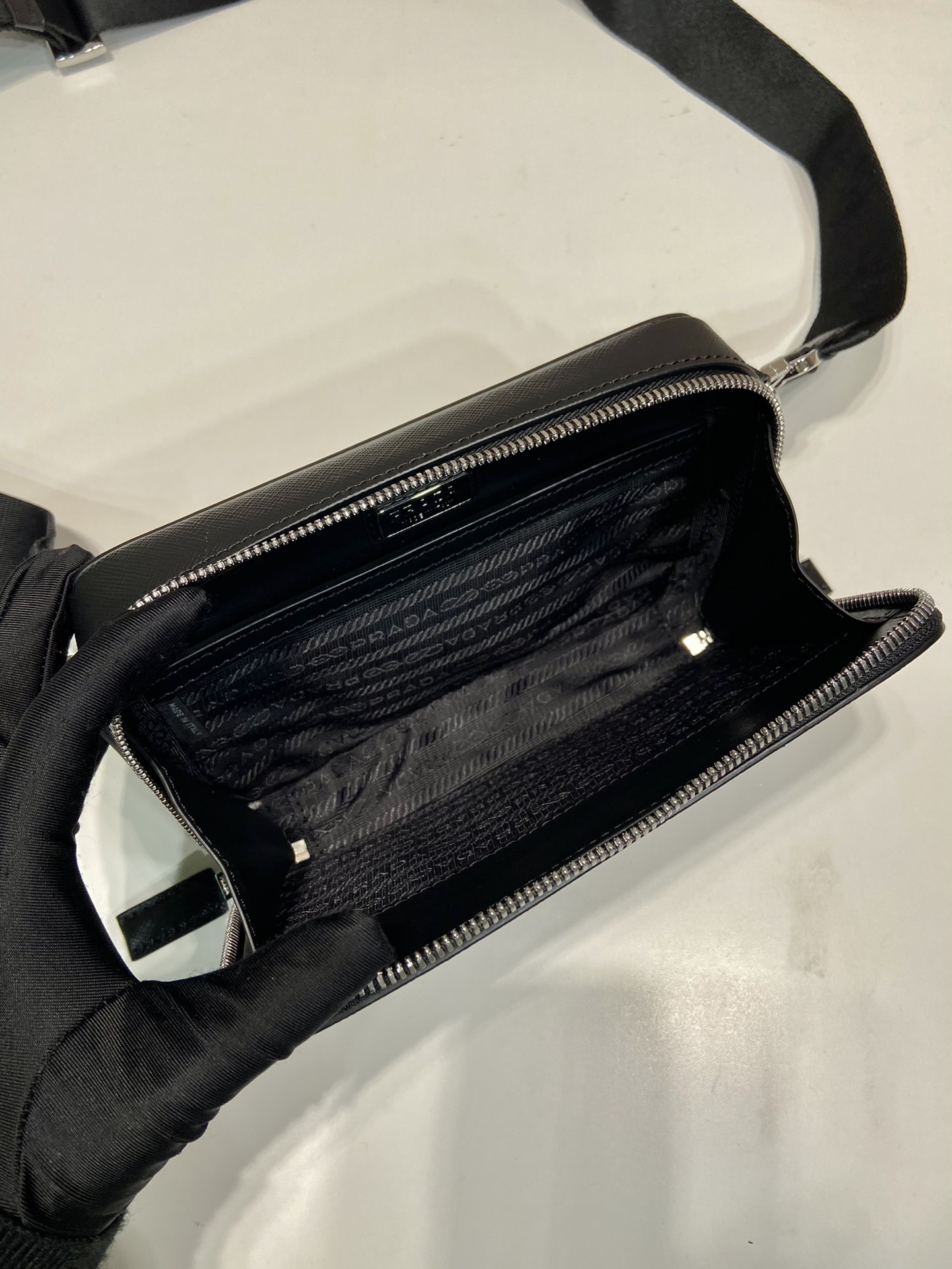Pra*a brique saffiano leather bag
