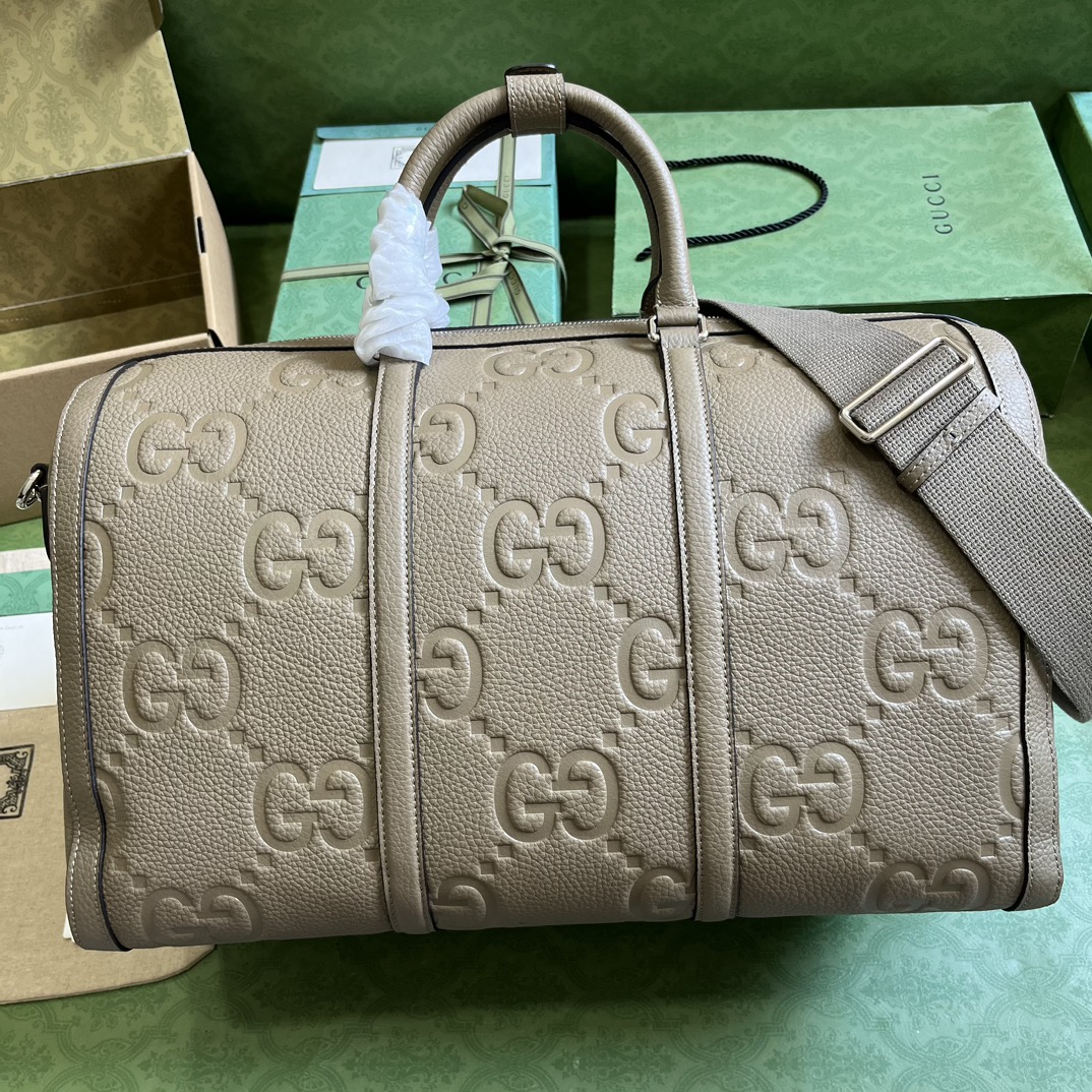 G*u*i gg duffle bag