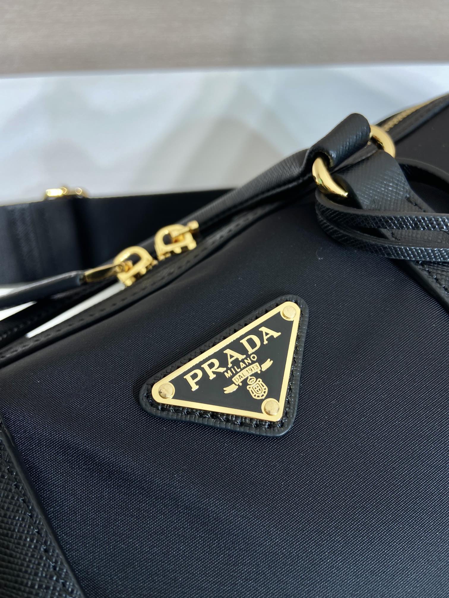 Pra*a re-edition 1978 medium re-nylon and saffiano leather top-handle bag