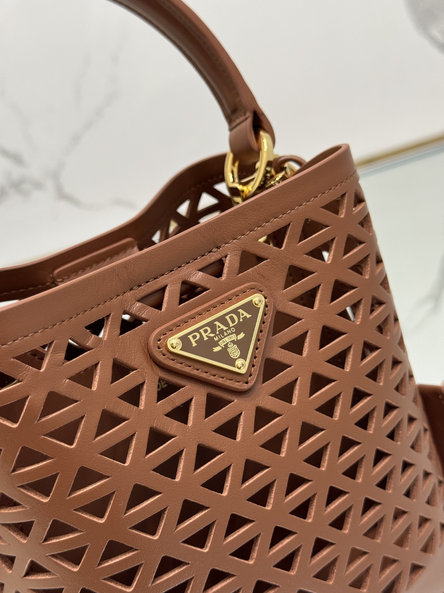 Pra*a small saffiano leather bag