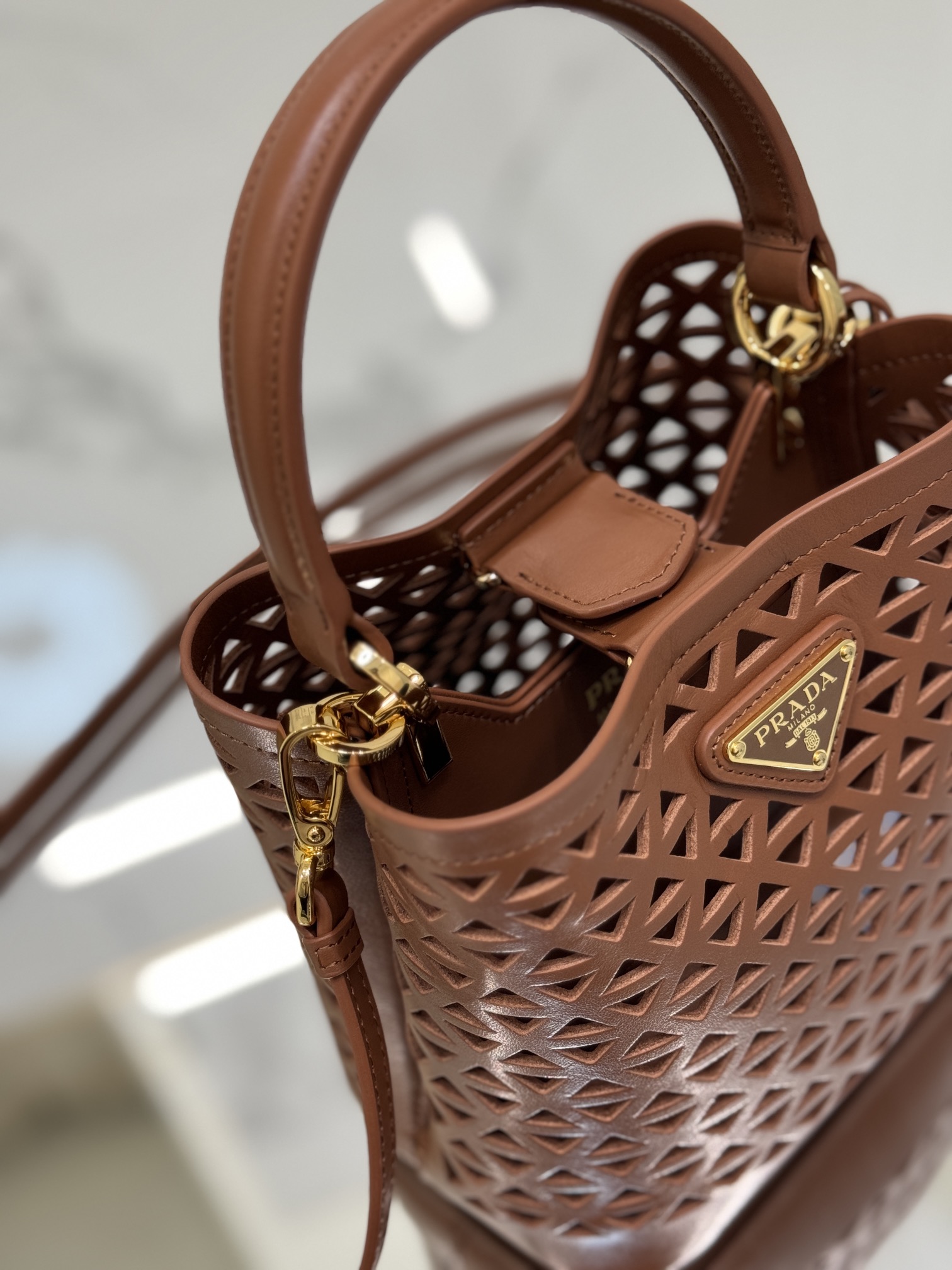 Pra*a small saffiano leather bag