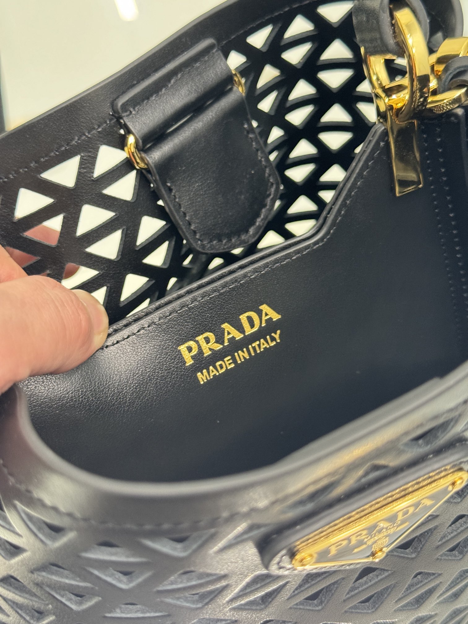 Pra*a small saffiano leather bag