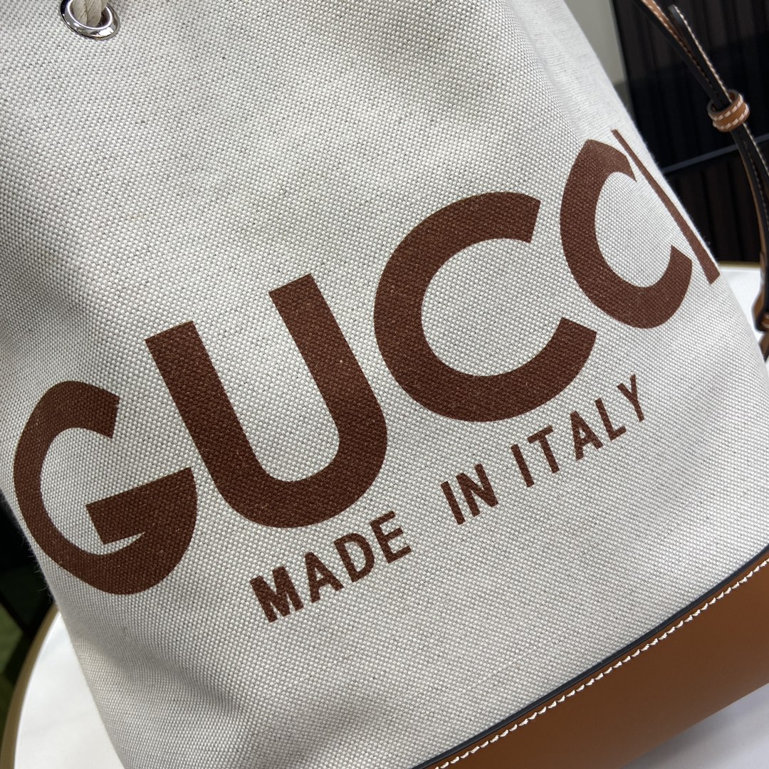G*u*i small shoulder bag with G*u*i print