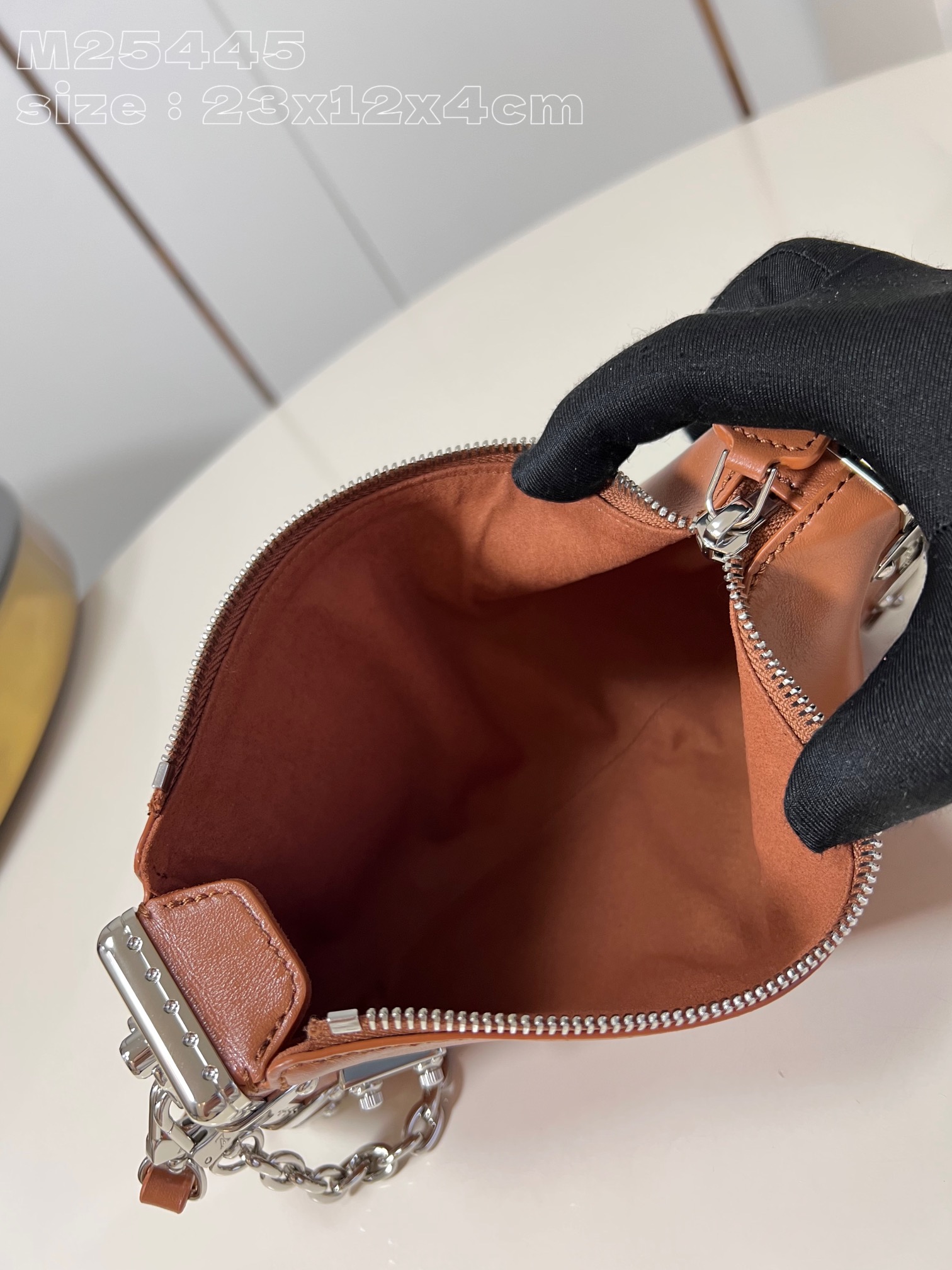 l**is V*t*n slim trunk handbag