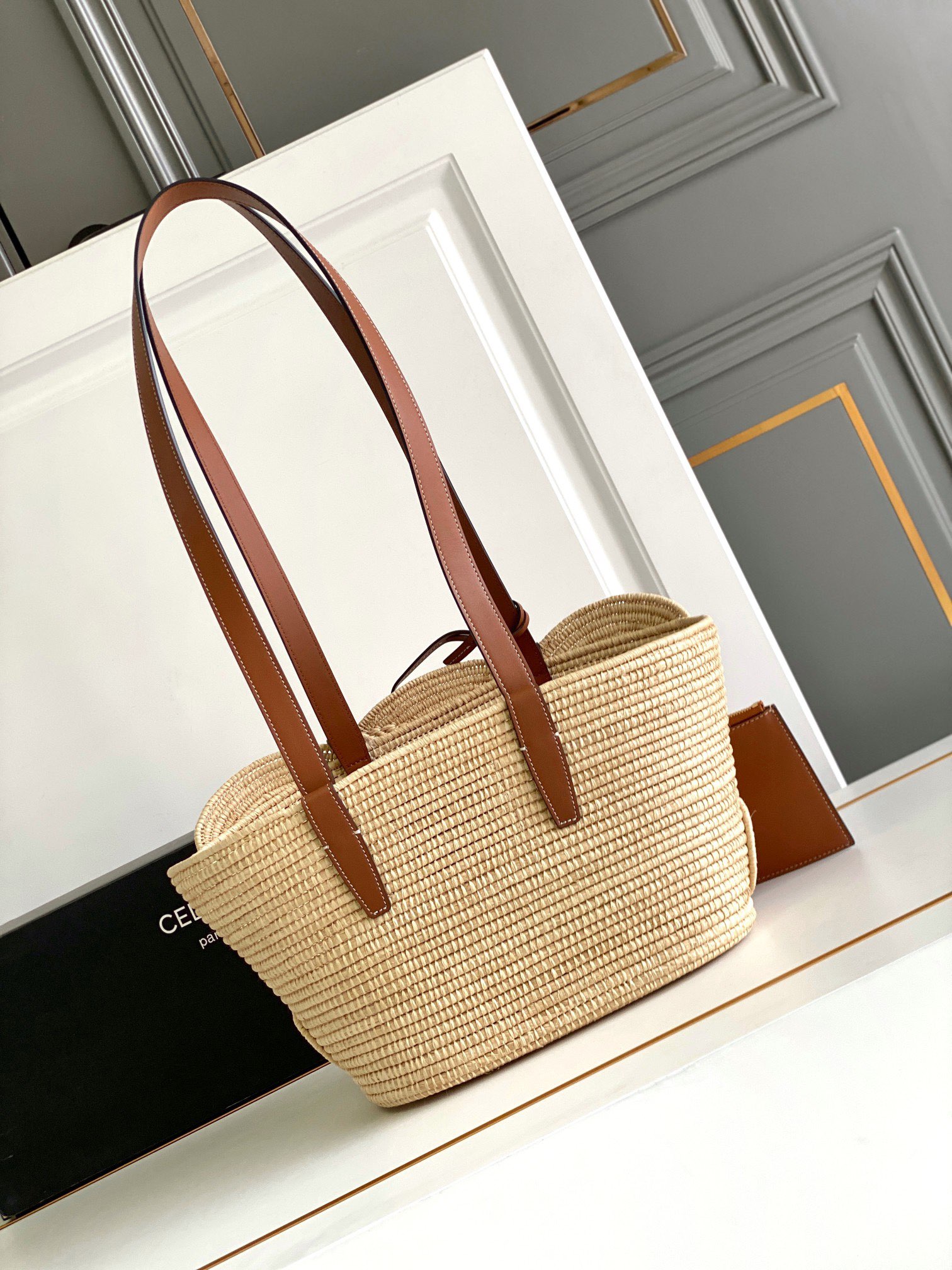 Ce**e Ce**e classic panier small braided triomphe in raffia and calfskin tan